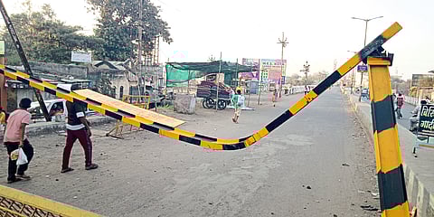 A bent pillar of nerve to some vehicles on a large bridge.