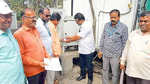 Municipality team while sealing the mobile tower in the city.
