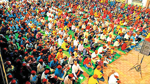 Crowd reciting Hanuman Chalisa in front of Gram Panchayat office here.