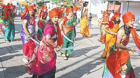 Women performing swords demonstrations during the New Year Swagat Yatra.