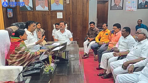 BJP City District President Anup Aggarwal speaking at a meeting of corporators and officials in the delimitation area