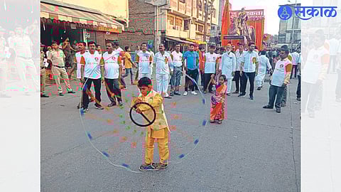 Children performing manly games in Shiv Jayanti procession as well as the 15 feet equestrian statue of Chhatrapati Shivaji Maharaj which became the attraction of the procession.