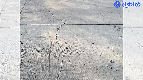 Cracks in the concreted road at Bangaon Budruk between Nandgaon-Yewla road.