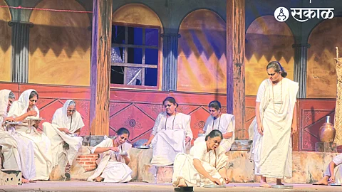 Actors performing scenes from Vrindavan drama in the finals of the State Drama Competition.
