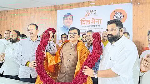 While felicitating Shiv Sena leader MP Sanjay Raut, Deputy Leaders Advay Hire, Sunil Bagul along with District Chief Vijay Karanjkar.