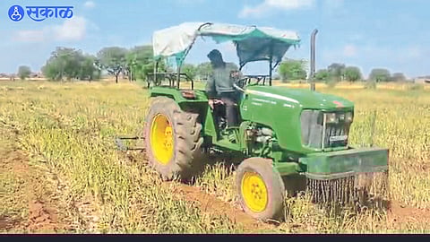 unseasonal rain farmers harvested onions by hooking tractor to vakhar dhule news