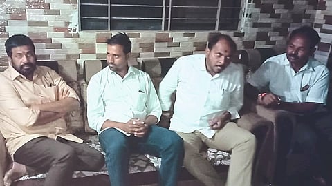 MLA Bachu Kadu while meeting Anil Borgude who protested by rotating rotor on onion crop