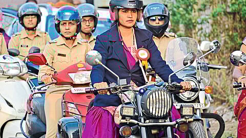 Women participating in a two-wheeler rally organized by Ghe Bharari organization on the occasion of Women's Day.