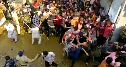 Police baton charge to prevent a large crowd to enjoy Rahad Rangotsav from creating stampede situation nashik news