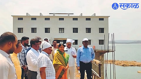 Mayor Pratibha Chaudhary inspecting Akkalpada water supply scheme for Dhule city water supply. Neighboring Commissioner Devidas Tekale