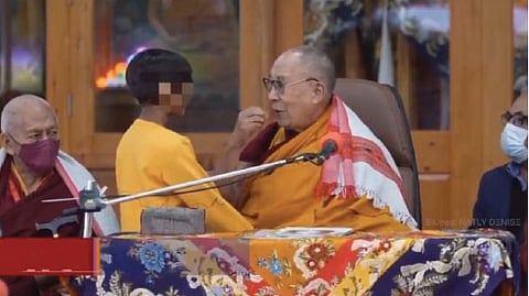 Dalai Lama apologises kissing young boy lips asking child suck tongue