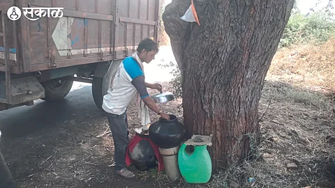Farmer Manak Patil started a water pond for the passers-by on the farm dam.