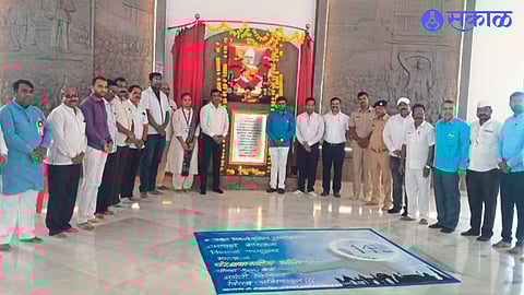 Officials saluting Bharat Ratna Dr. Babasaheb Ambedkar at Muktibhumi Memorial.