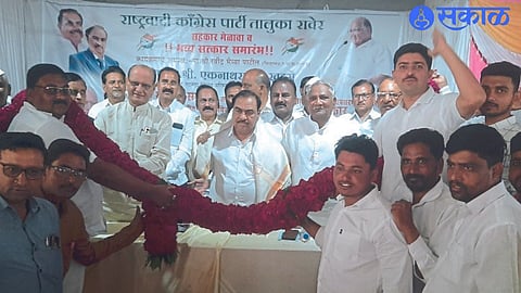 Activists felicitating senior leader and former minister Eknath Khadse for being elected as legislative group leader by Taluka NCP Congress.