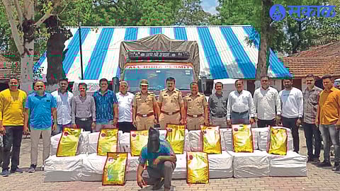 Police inspector A. with seized Gutkha. S. Agarkar and colleagues.