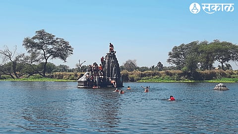 Youths enjoying a leisurely swim in the summer heat