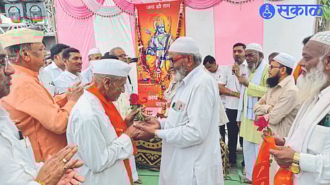 Officials and Muslim brothers of Jama Masjid Trust welcoming Shri Ram Mandir trustees and villagers with bouquets before the procession taken out on the occasion of Shri Ram Navami.