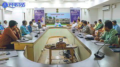 Collector Aman Mittal instructing the officials in the Road Safety Committee meeting.