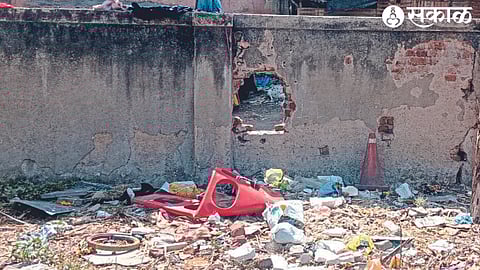 Bhadrakali police station protection wall debris and garbage lying there