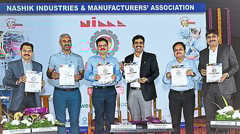 Divisional Commissioner Radhakrishna Game while releasing the information booklet of Nima Power exhibition on Monday