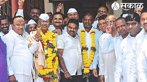 Kisan Dhange as Chairman of Agricultural Market Committee in Yevala and Adv. NCP leader Dilip Khaire, youth leader Sambhaji Pawar and officials while felicitating Bapusaheb Gaikwad.