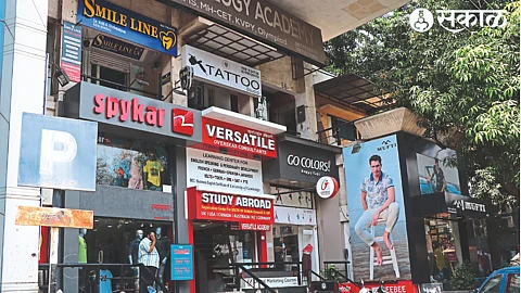 English signboards on shops on College Road.