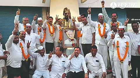 Shetkari Vikas Panel, cheering after winning the election of the buying and selling team.