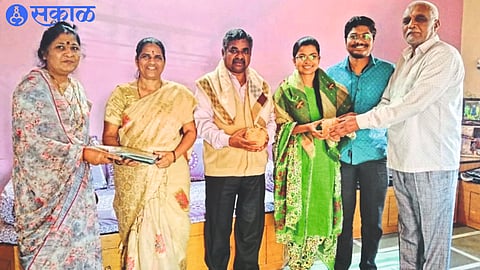 While congratulating Tripti Khairnar for being selected as Deputy Superintendent of Land Records, only Khairnar's neighbor Prof. Sambhaji Khairnar etc.