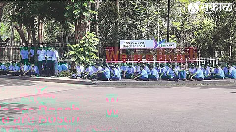Workers arriving to join work at the gates of the Bosch company