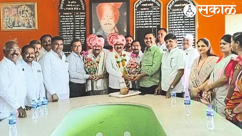 Former Chairman Keda Aher felicitated Yogesh Aher and Deputy Chairman Abhiman Pawar for their unopposed election as Chairman of the Market Committee. Adjacent Authorized Officer Sujay Pote and Director