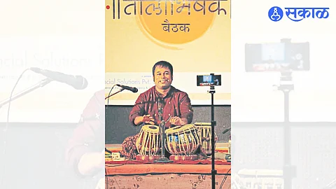 Mumbai's Swapnil Bhise playing the tabla during the talabhishek meeting held at the Kusumagraj memorial on Saturday.