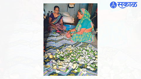 Housewife boiling curry to prepare pickle.