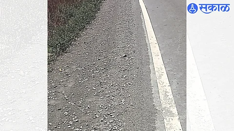 Gravel leading to accidents on the state highway in Chikhall Ohol Shiwar in Gigaon Phata.