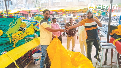 Farmers buying plastic in the plastic market