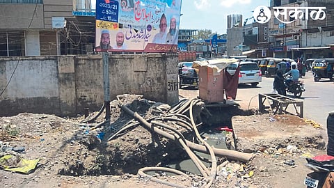 A dangerous open drain in front of the new bus stand at Malegaon