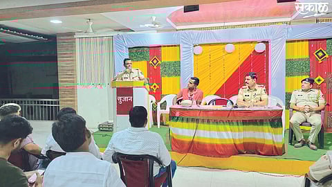 Amalner: Sub-Divisional Police Officer Sunil Nandwalkar while guiding the peace committee meeting. Police Inspector Vijay Shinde and others on the platform.