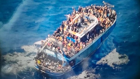At least 79 dead after overcrowded migrant vessel sinks off Greece hundreds missing