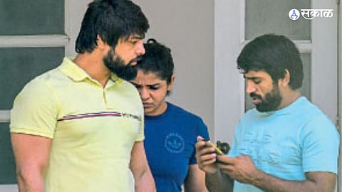 wrestlers meet sports minister anurag thakur protest hold till 15th june sakshi malik