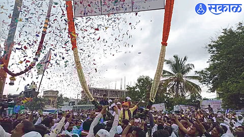Citizens welcoming Chhagan Bhujbal, who arrived for the first time on Friday after taking oath as a minister, with a thirty-foot garland