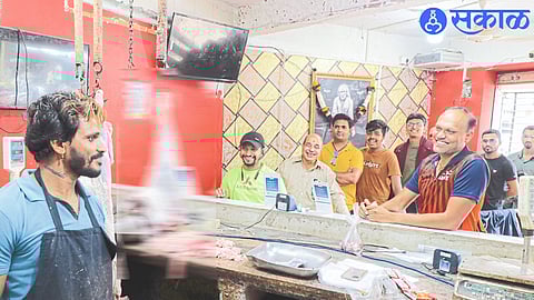 A queue to buy mutton on Sunday on the eve of Gutari Amavasya