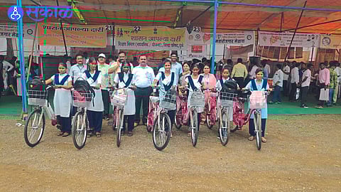 Education officers along with the beneficiary students of Arvi under cycle sharing scheme.