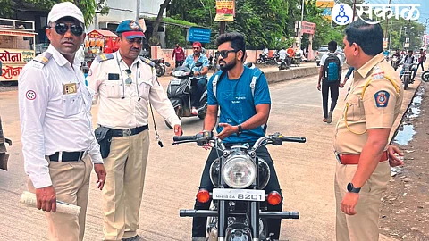 A police team of city traffic control branch checking bullet riders in the city.
