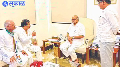 Nashik District President Kondajimama Awad in discussion with NCP National President Sharad Pawar at Silver Oak. Neighbors Somnath Bhise, Dattatraya Malode.