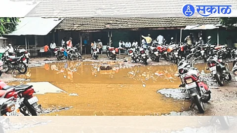 Stagnant water and filth everywhere in the work place of stamp sellers.