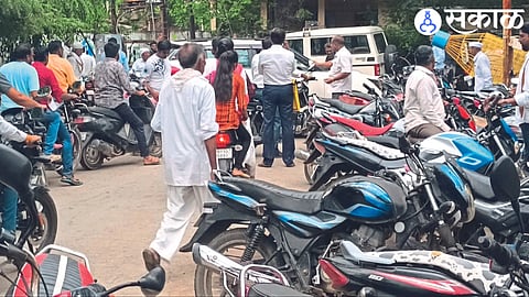 The road was closed due to vehicles being parked in front of the administrative building.