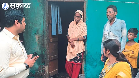 Collector Aman Mittal while interacting with the villagers whose essential goods were carried away.