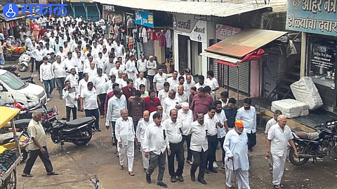 Jain brothers participating in the march organized by the entire Jain community to the police station to protest the killing of Jain sages.