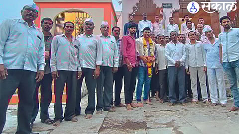 Ravikant accepting the felicitation from the villagers after being promoted to the post of Police Sub-Inspector.