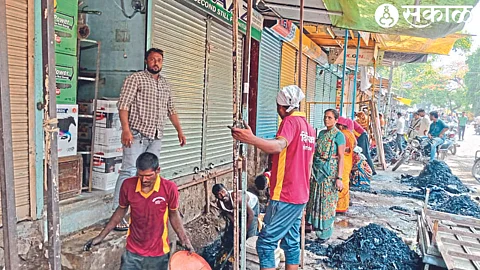 Sanitation workers descend into the sewers to clean the sewers from the bottom after removing encroachments from the scrap market