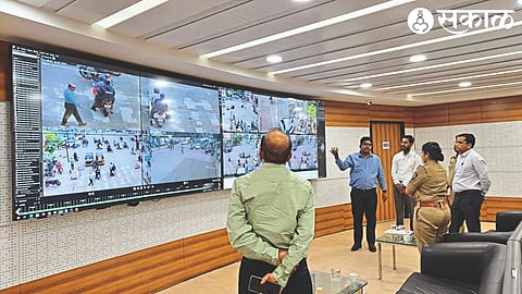 Police officers inspecting the Command Control Center of SmartCity Company